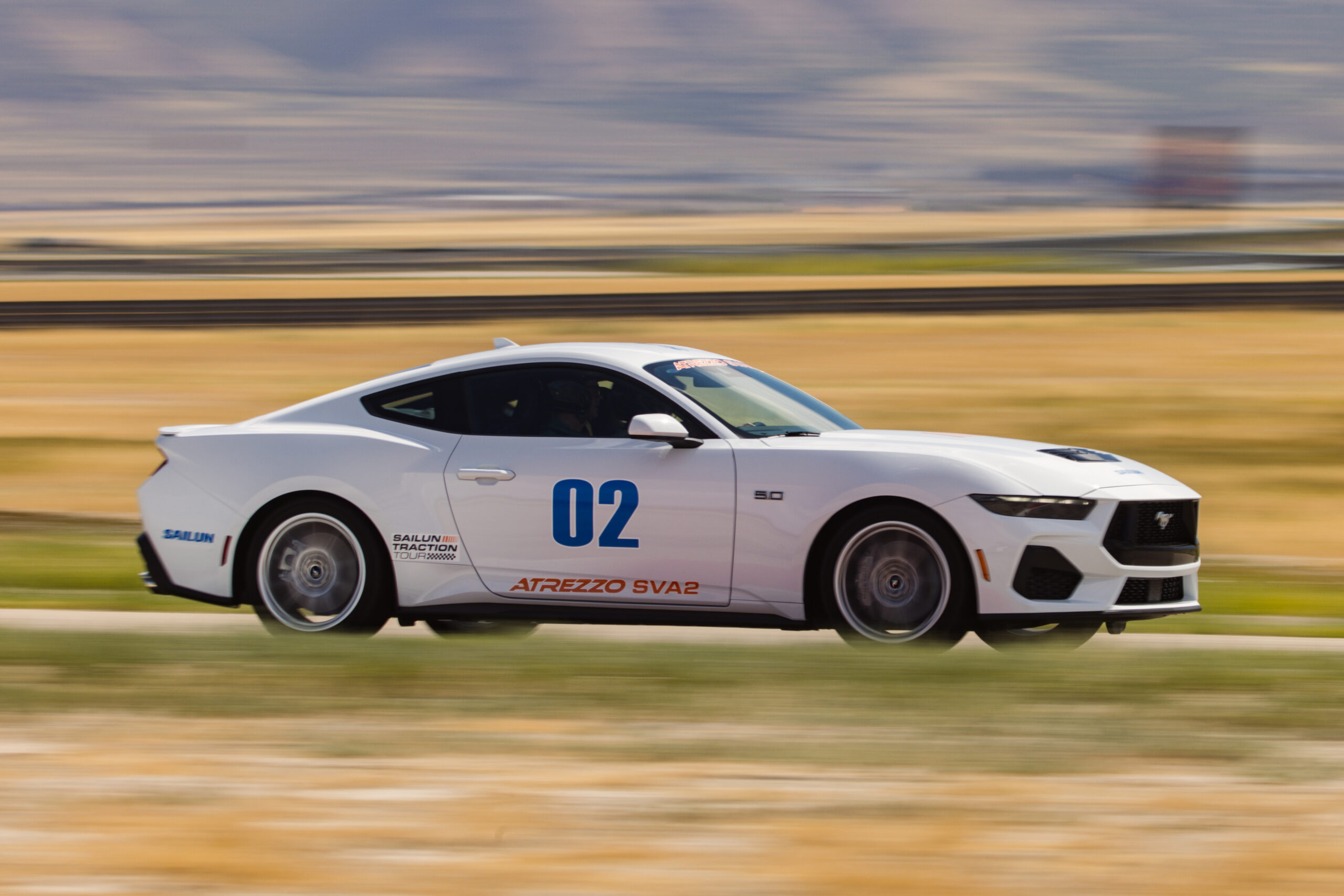 Sailun Atrezzo SVA2 tire on test vehicle during on-track evaluation by AutoGuide at Utah Motorsports Campus in hot summer conditions (96 °F / 35 °C).